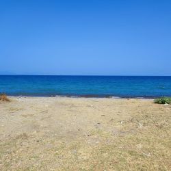 Foto di Guzelcamli beach con una superficie del acqua cristallina